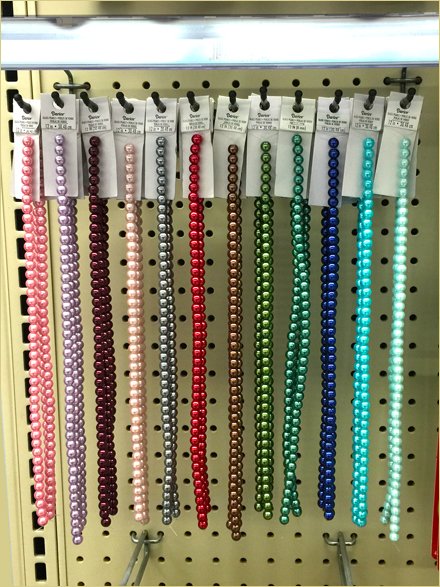 Single-Lug Plastic Display Hooks Maximize Merchandising Space